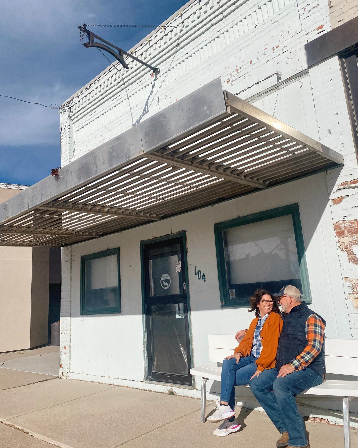 Cute couple in front of old building